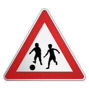 Dreieckiges Verkehrsschild: Spielende Kinder! 
