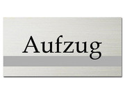 Diese Hinweisschilder in elegantem, klassischen Design wird einen bleibenden Eindruck hinterlassen. Das Schild ist aus silberfarbenem gebürsteten Aluminium und kann auf glatten Oberflächen problemlos ... Hinweisschild - Aufzug - ClassicLine - Größe: 200 x 100 mm